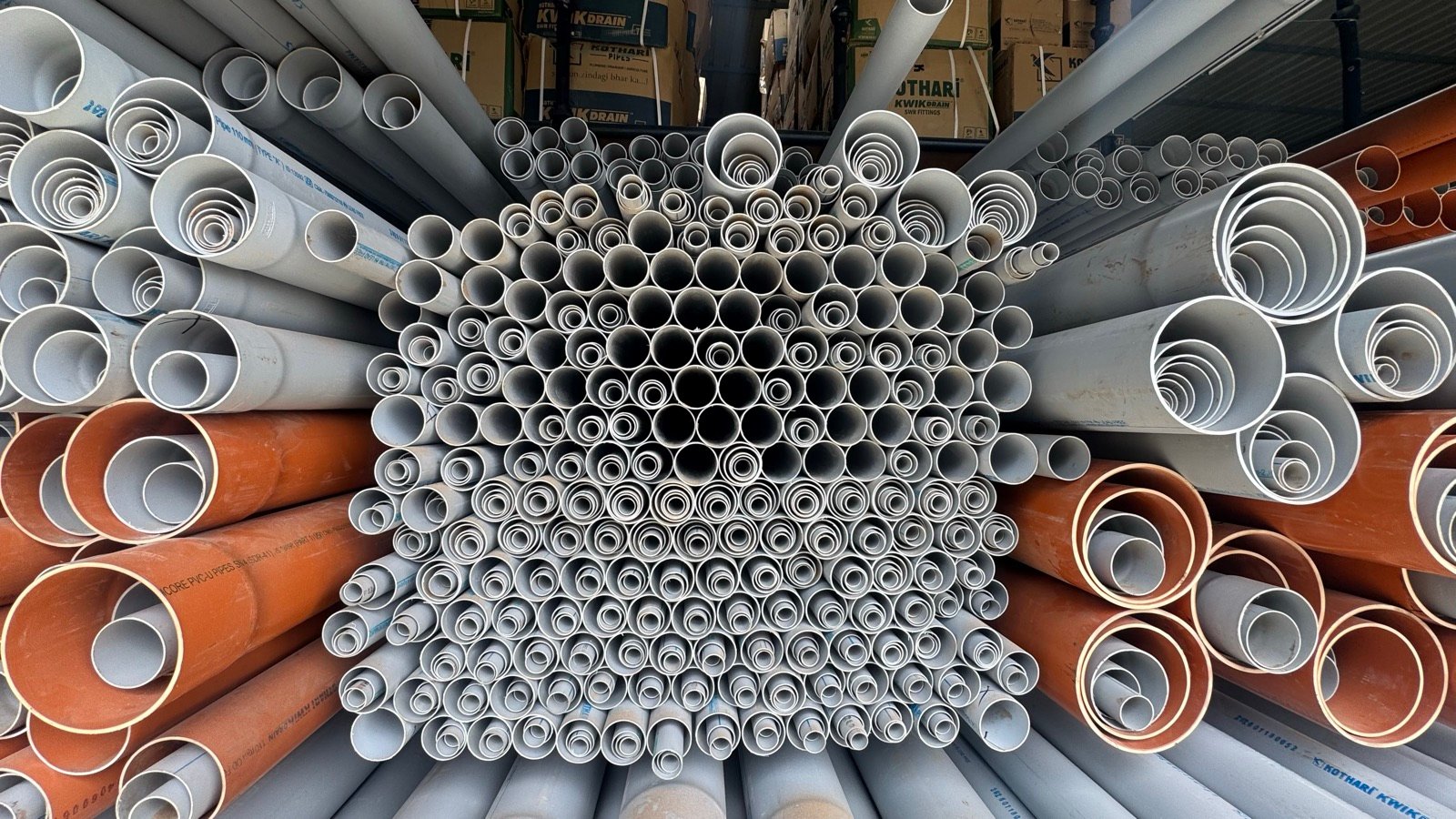 Close-up of stacked Kothari pipe ends at the JAD warehouse