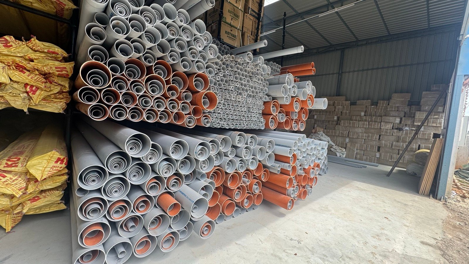 Stacked SWR and UPVC pipes on racking at the JAD Bengaluru warehouse